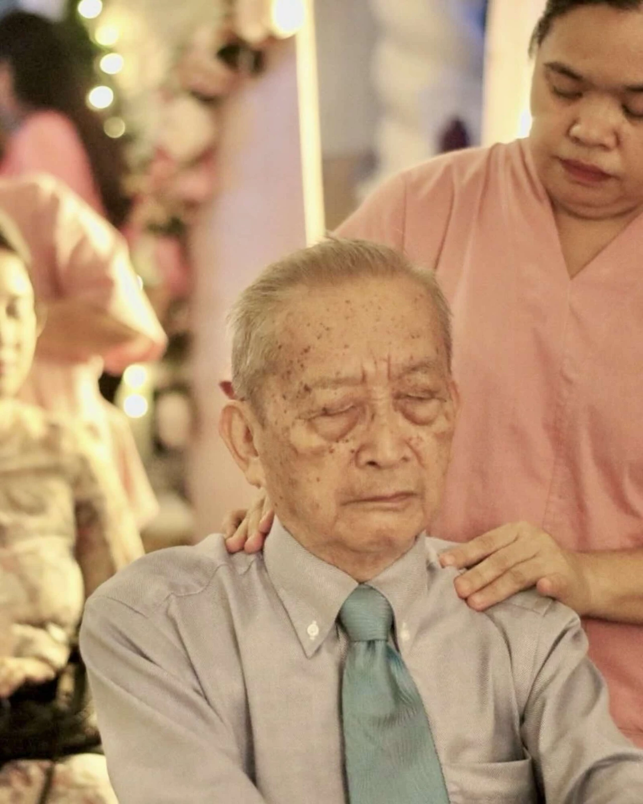 A guest enjoying a seated massage at an event